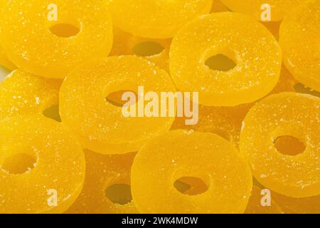 A tantalizing close-up of a vibrant orange-yellow pineapple marmalade spread in a classic glass jar, perfect for enhancing your breakfast or snack wit Stock Photo