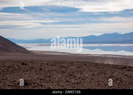 Lake Manly doesn't appear often in Badwater Basin in Death Valley National Park, and is now a popular tourist destination. Stock Photo