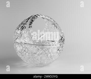 Empty crystal candy bowl on a white background. The vase was made in the mid-20th century. Stock Photo