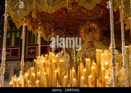 Procession of the pallium of the Virgen de la Esperanza Macarena in the early morning of Holy Week in Seville, Spain Stock Photo