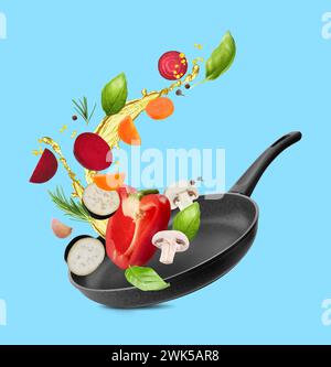 Different vegetables, oil, frying pan in air on light blue background Stock Photo