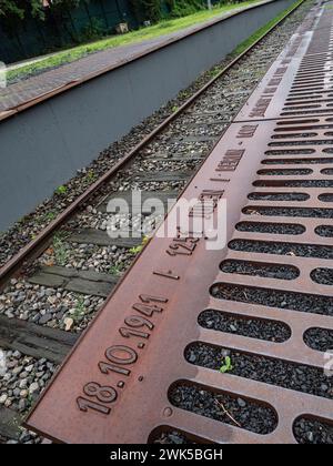 Detail showing the cast iron plates and railway track, Platform 17 Memorial, a Holocaust memorial site in Berlin-Grunewald Station, Berlin, Germany. Stock Photo