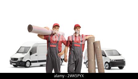 Vans and male workers in uniforms with carpets isolated on white background, carpet cleaning service Stock Photo