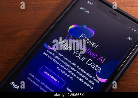 Scale AI website seen in iPhone screen. Scale AI is a company that provides data processing and labeling services to enhance AI technology. Stock Photo