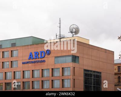 ARD Hauptstadtstudio building exterior in Berlin. The logo sign of the tv and news studio is on the facade and a big satellite dish on the rooftop. Stock Photo