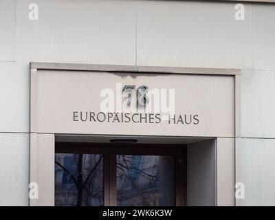 Europäisches Haus name sign and number on a building facade above the entrance. The address is Unter den Linden 78 in the Mitte district in Berlin. Stock Photo