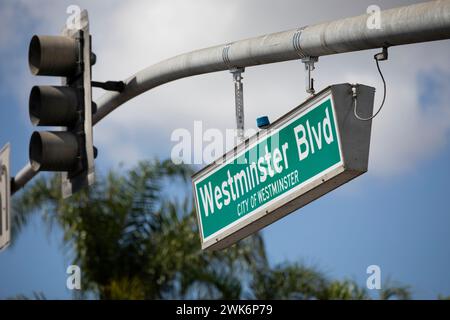 Westminster, California, USA - October 1, 2023: Afternoon light shines on a Westminster Blvd street sign. Stock Photo