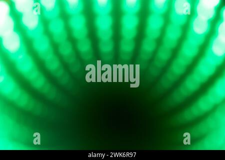 Green and black abstract dot lightburst pattern Stock Photo