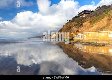 Clouds Reflected in Low Tide Surf below Scripps Oceanography Institute.  Scenic La Jolla Shores Pacific Ocean Beach Landscape San Diego California USA Stock Photo