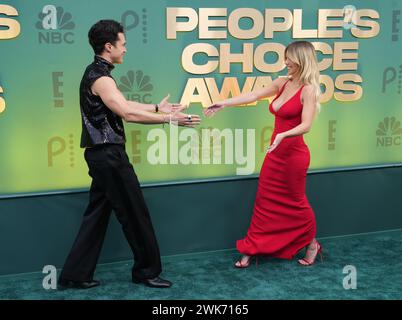 Los Angeles, USA. 18th Feb, 2024. (L-R) Darren Barnet and Sydney Sweeney walking on the red carpet at the People's Choice Awards held at the The Barker Hangar in Santa Monica, CA on Sunday, ?February 18, 2024. (Photo By Sthanlee B. Mirador/Sipa USA) Credit: Sipa USA/Alamy Live News Stock Photo