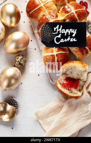 Easter table scene with an assortment of breads, desserts and treats on a white background. Top view. Spring holiday food concept. Stock Photo