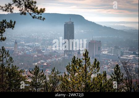 View of the city of Jena with the Jentower (Uniturm) and the Kernberge in the background, in low fog in the morning, Jena, Thuringia, Germany Stock Photo
