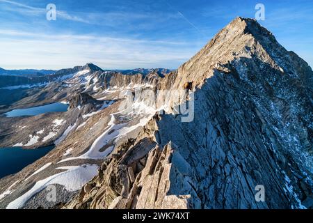 Mountain climbing on the Knife Edge Ridge of Capitol Peak mountain, Colorado, USA Stock Photo