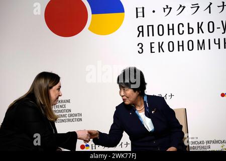 Tokyo, Japan. 19th Feb, 2024. Anna Yurchenko, Ukrainian Deputy Minister of Regional Development, Construction, Housing, and Communal Services, left, and Japan's Foreign Minister Yoko Kamikawa, right, shake hands during Women, Peace and Security (WPS) session as part of Japan Ukraine Conference for Promotion of Economic Growth and Reconstruction at Japan Business Federation Monday, Feb. 19, 2024, in Tokyo. Credit: ZUMA Press, Inc./Alamy Live News Stock Photo