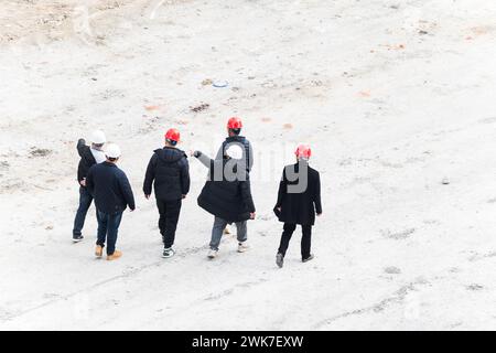 Workers checking quality at construction site Stock Photo