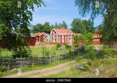 Well preserved old historical hamlet and the surrounding landscape in Stensjo by, Sweden Stock Photo