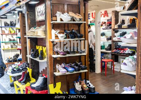 Harajuku ward Tokyo, fashionable and high heel shoes and platform boots footwear at a store in Takeshita Dori street, youth culture,Japan,Asia,2023 Stock Photo