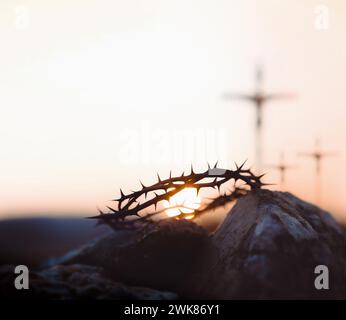 Calvary, Golgotha Hill, Jesus Christ's cross and crown of thorns, Jesus' passion and great trials during Passion Week, Lent and Easter background Stock Photo