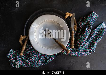 Minimalistic table setting in dark colors Stock Photo