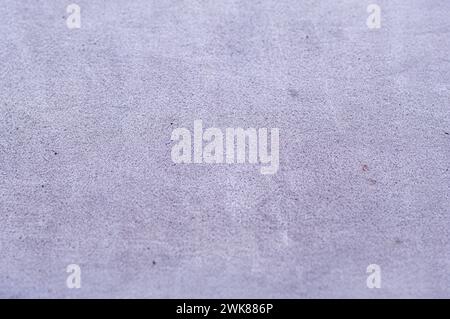 A purple textured background suitable for design projects Stock Photo