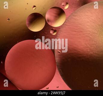 Abstract oil bubbles on water with reflections of colors and patterns. Abstract background. Abstract screensaver. Abstract artwork. Stock Photo
