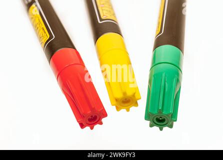 Red, yellow and green permanent markers or markers on a white background. Stock Photo