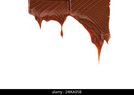 Piece of melted chocolate bar isolated on white background. Chocolate drips. Stock Photo