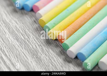 Colorful chalk pastels on a board texture close up. Rainbow colors. Stock Photo