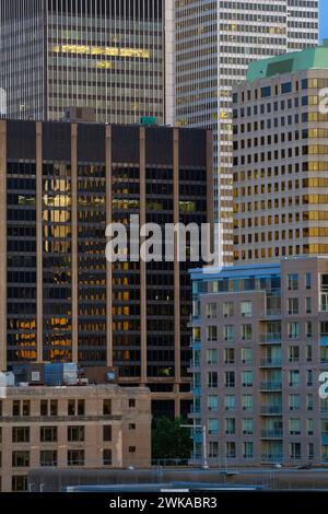 Modern office buildings with the lights still on at dawn, Montreal, Quebec, Canada. Stock Photo