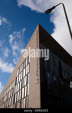 Glasgow Scotland: 12th Feb 2024: University of Strathclyde sign on exterior of modern building in Glasgow city centre on sunny day Stock Photo