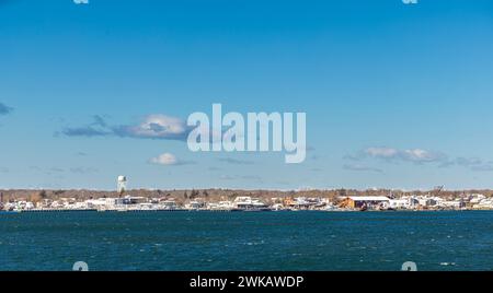 view of the village of greenport from shelter island on a cold winter day Stock Photo