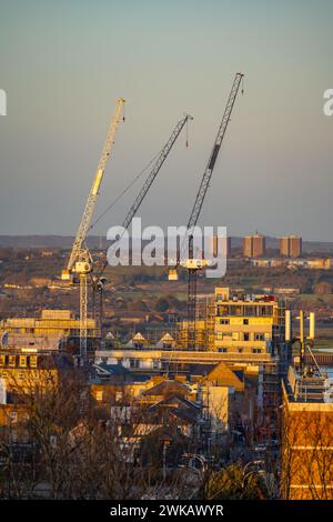 View from windmill hill Gravesend at sunset with cranes on development in town centre Stock Photo