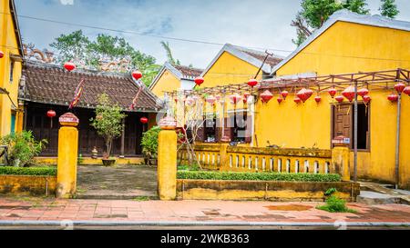 A courtyard decorated with Chinese lanterns in the old part of historic town of Hoi An, Vietnam Stock Photo
