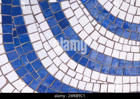 Vintage blue and white mosaic background. Mosaic pattern texture close up in retro style. Colorful polygons background. Stock Photo