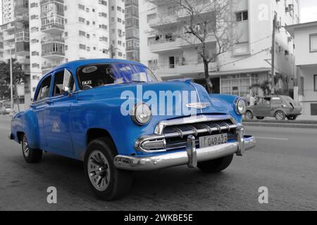 012 Old blue painted almendron car -yank tank, Chevrolet American classic- from 1952 on Linea street, El Vedado neighbourhood. Havana-Cuba. Stock Photo