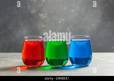 Rgb color water in glass on table, Rgb color model concept Stock Photo