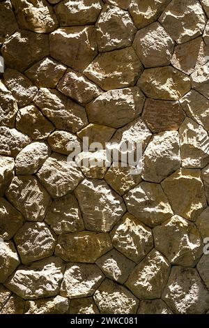 Patterns made from light and shadows on stone wall. Stock Photo