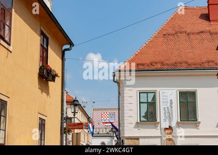 Zagreb Croatia - May 23 2011;  Different European architectural facades and banner for Museum of Broken Relationships in city's upper town. Stock Photo