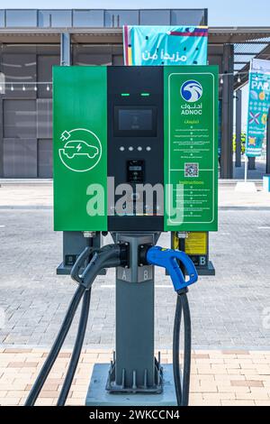 An Adnoc electric vehicle charging station in Masdar City, Abu Dhabi Stock Photo