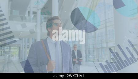 Image of statistics processing over businessman Stock Photo