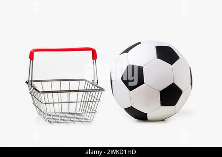 Soccer ball and shopping basket isolated on white Stock Photo