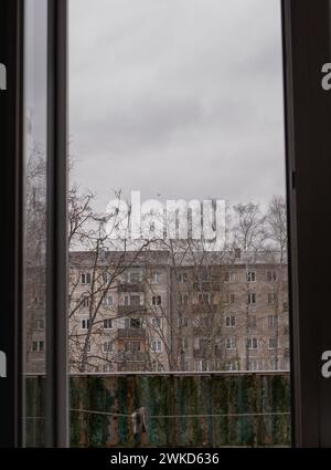 view from balcony old soviet building gray sky Latvia,Riga 20.02.2024 Stock Photo