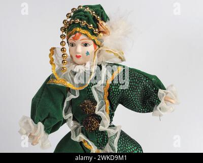Garham, Germany. 19th Feb, 2024. Porcelain Italian doll depicting the hero of the Commedia Dell'arte in a green suit. Porcelain dolls appeared in the 18th century in France. (Photo by Igor Golovniov/SOPA Images/Sipa USA) Credit: Sipa USA/Alamy Live News Stock Photo