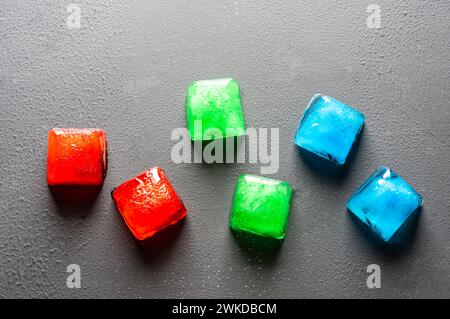 Rgb color ices in on dark table, Rgb color model concept Stock Photo