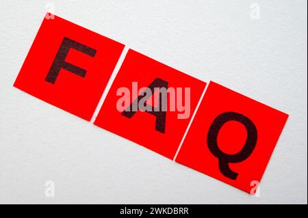 Colorful cards with FAQ, frequently asked questions written on them. Stock Photo