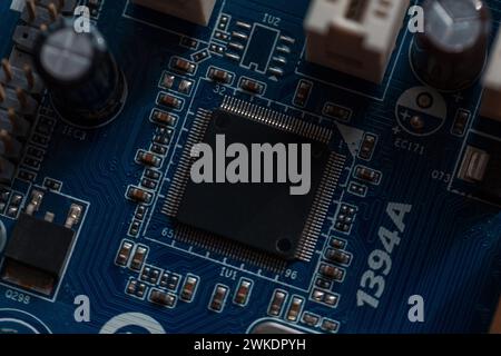 Chip and computer hardware, close-up. Motherboard with transistors Stock Photo