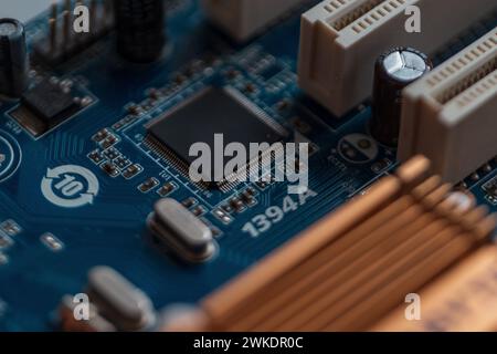 Technology, computer board with chips and transistors, concept. Ai and hardware. Silicon Stock Photo
