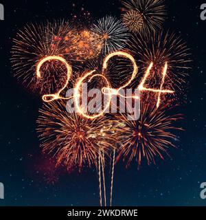 Happy New Year 2024. Festive golden fireworks explode in the starry sky Stock Photo