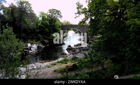 The River Lune and Devil's Bridge at Kirby Lonsdale in Cumbria, UK. Built in 12th or 13th century, iIt is a popular meeting place for motorcyclists Stock Photo