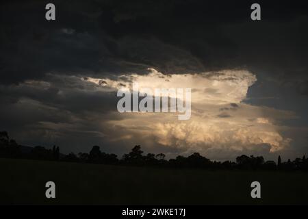 Massive thunderstorm clouds rolling across the park Stock Photo